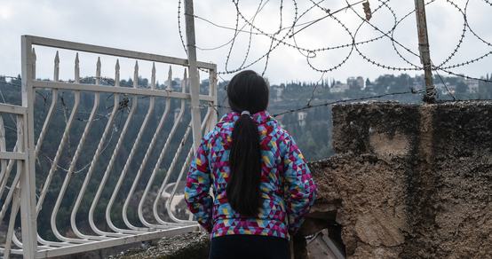 Girl from OPT in front of barbed wire_War Child in OPT_191211